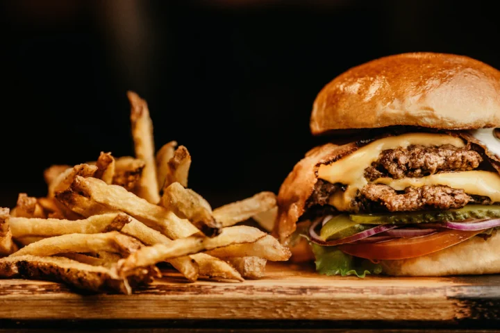 Double cheeseburger served with French fries