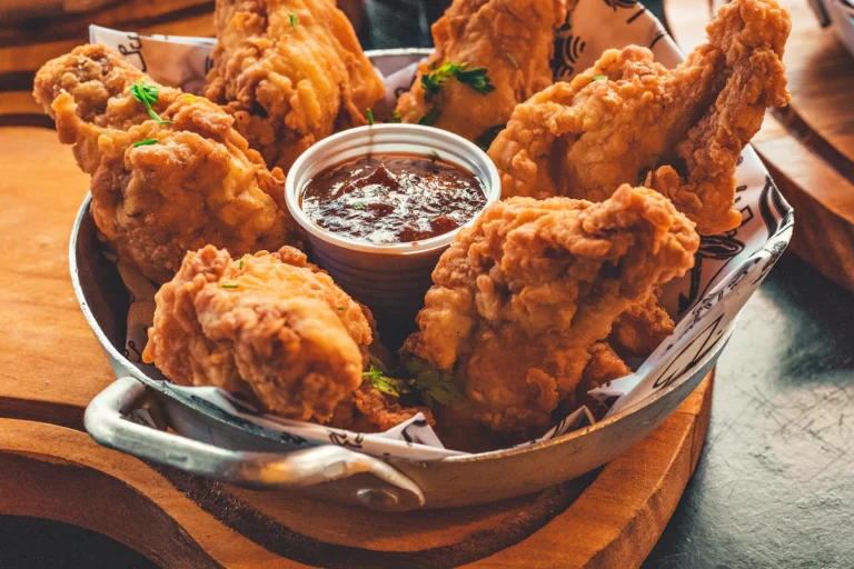 Bowl of crispy fried chicken pieces with dipping sauce