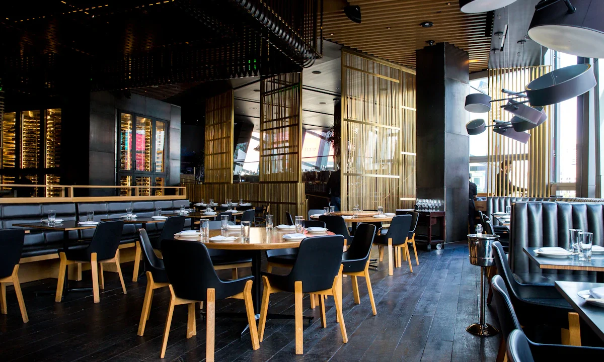 Modern restaurant dining room with tables and chairs
